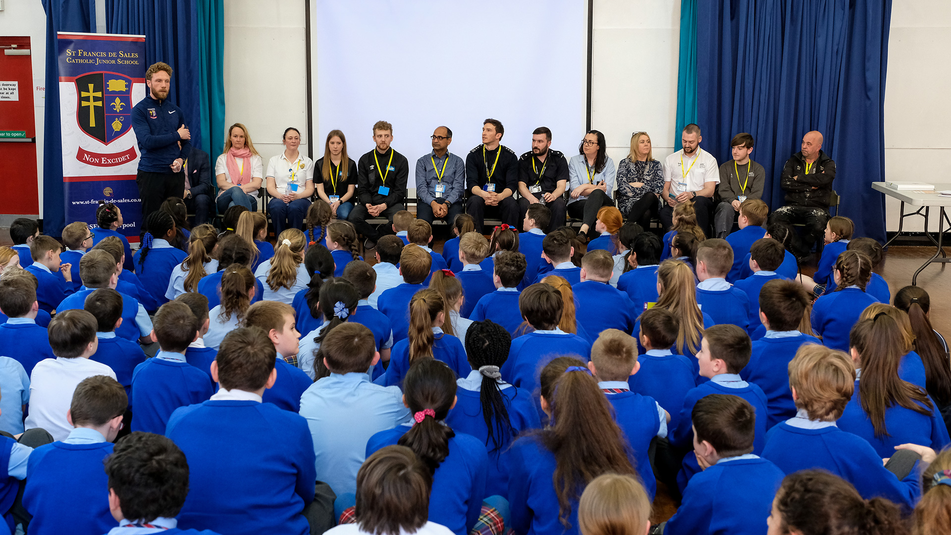 children listening to businesses about their job roles