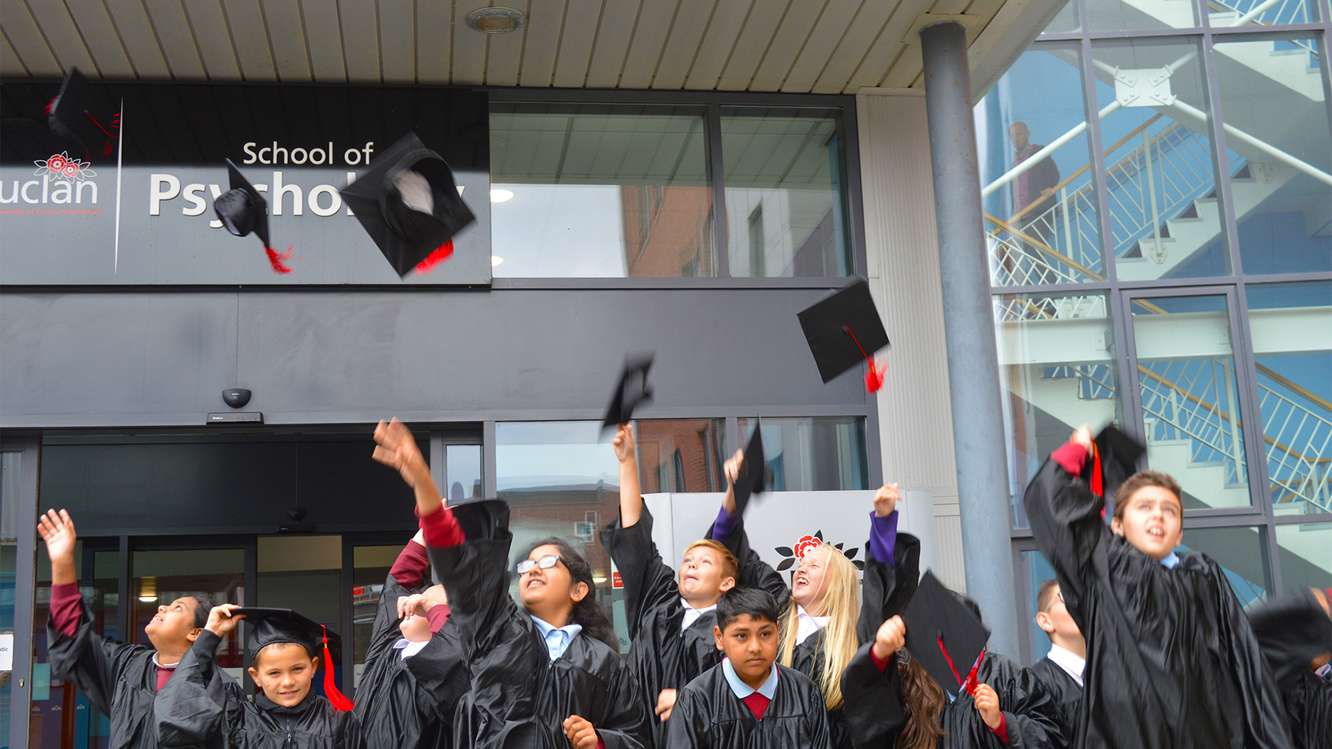 children celebrating graduating from the raising aspiration programme